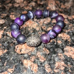 Amazing Mgems purple stone stretchy bracelet with shiny silver bead.